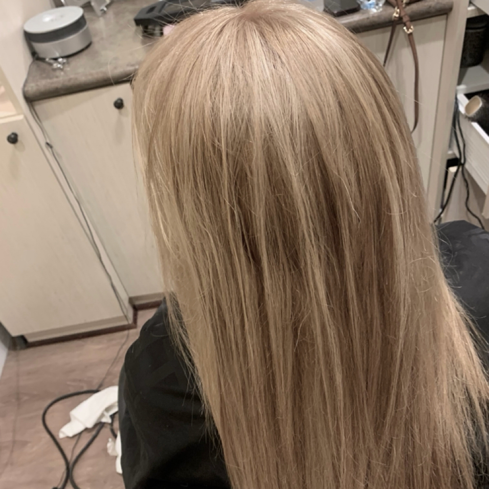 Partial highlights and face-framing hair color at an Alpharetta, Georgia salon